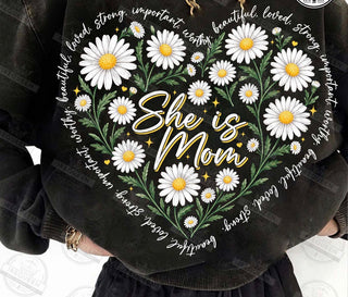 SHE IS MOM