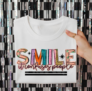 SMILE IT CONFUSES PEOPLE
